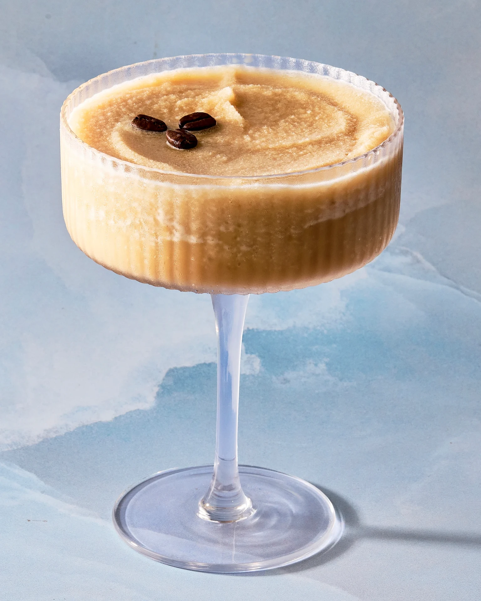 Frozen espresso martini topped with coffee beans